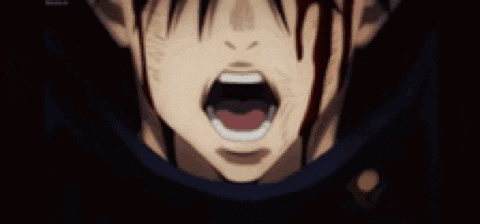 a close up of a man 's face with blood coming out of his mouth .