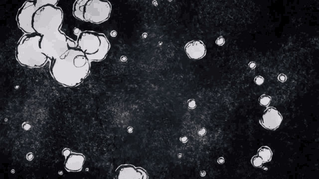 a black and white drawing of bubbles floating in the air