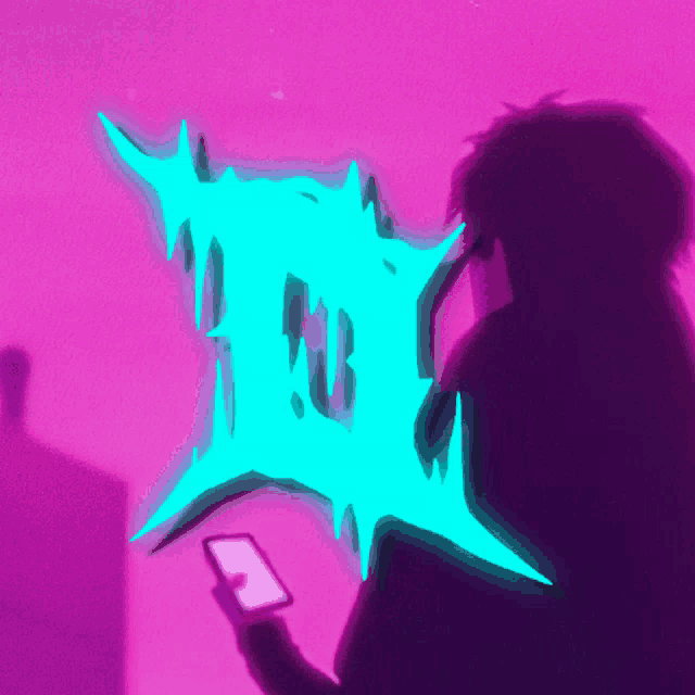 a person holding a cell phone in front of a neon sign that says ' i ' on it