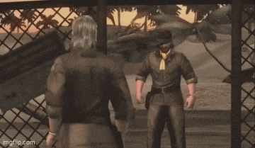 two men are standing next to each other behind a fence in a video game .