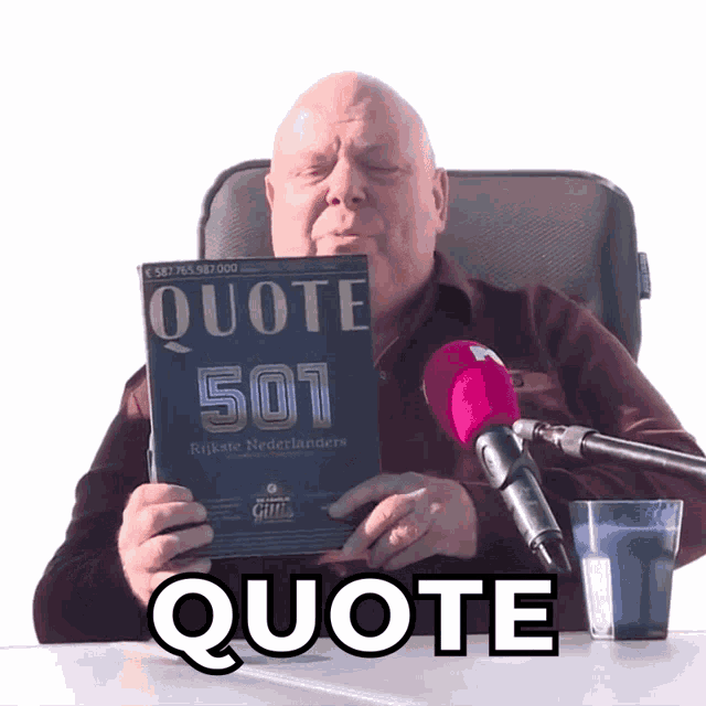 a man holding a book titled quote 501