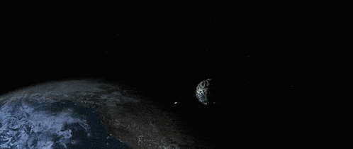 a blue light is shining on the earth