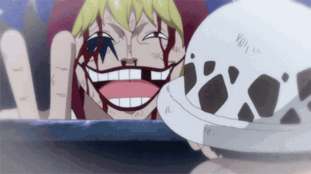 a cartoon character with blood on his face is smiling next to a white helmet