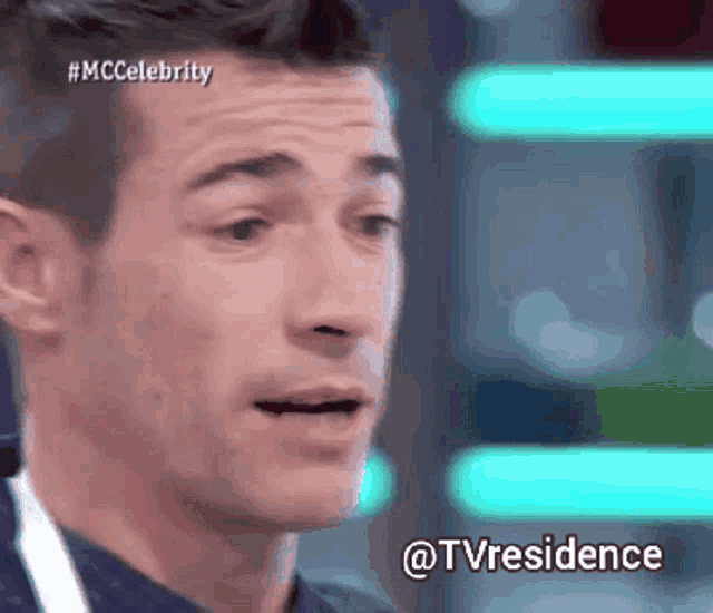 a close up of a man 's face with the hashtag #mccelebrity visible
