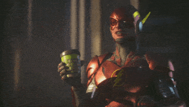 a man in a flash costume is drinking from a green cup with a lightning bolt on it