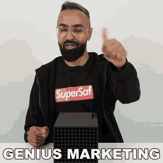 a man wearing a black shirt that says supersaf