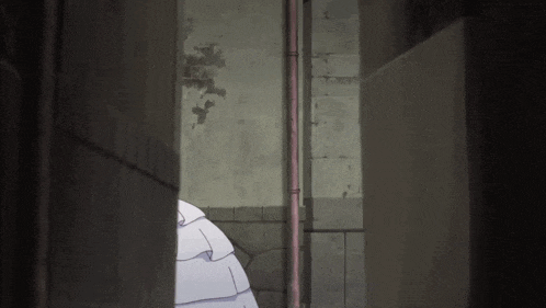 a woman in a white dress is standing in a dark alleyway
