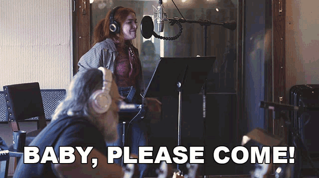 a woman singing into a microphone next to a man with the words baby please come