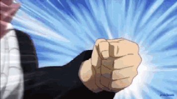 a close up of a person 's fist against a blue background