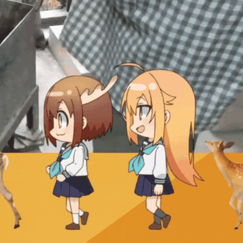 two anime girls with antlers are standing next to each other