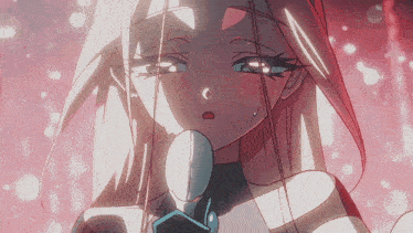 a close up of a girl 's face with a tear running down her cheek