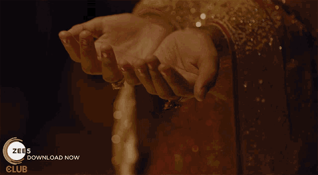 a close up of a woman 's hands with the words " zees download now " below them
