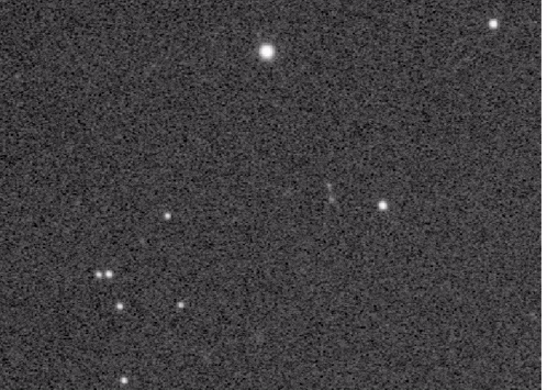 a black and white image of a starry sky