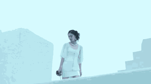 a woman in a white dress is being attacked by a monster with a red icon with the number 1 on it