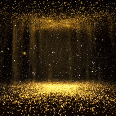 a dark room with a lot of gold glitter coming out of the ceiling