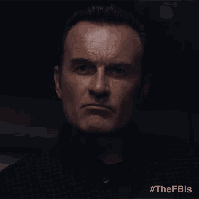 a close up of a man 's face with #thefbls on the bottom