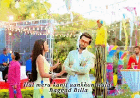 a man and a woman are standing next to each other with the words hai mera kanji aankhon wala baggad billa written below them