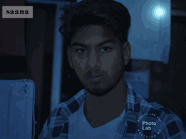 a picture of a young man with the name saana on the top