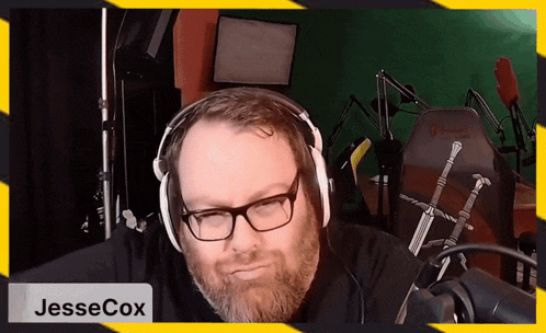 a man wearing headphones with the name jessecox on the bottom