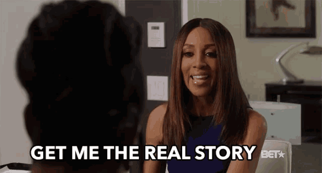 a woman talking to another woman with the words get me the real story bet