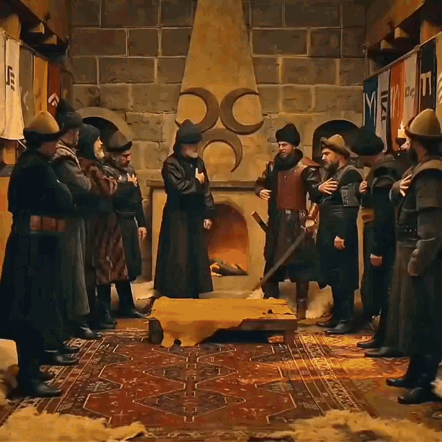 a group of men are standing in front of a fireplace with a flag that says ' yk ' on it