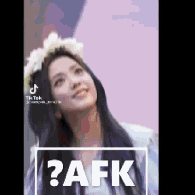 a woman with a flower crown on her head and the word afk on the bottom right