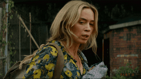a woman in a floral shirt is in a quiet place part ii scene