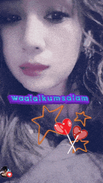 a picture of a woman with a purple sticker that says ' wadikumsalam '