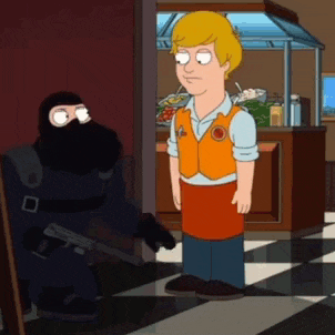 a man in an apron stands in front of a man in a mask