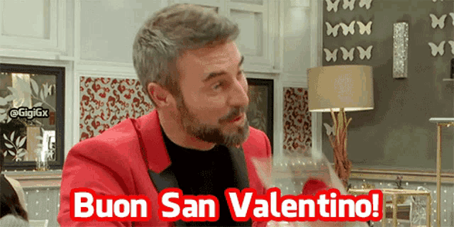 a man in a red suit with the words buon san valentino on the bottom