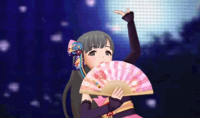 a girl in a pink dress is holding a pink fan in her hand