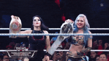 two women in a wrestling ring with vengeance written on the screen