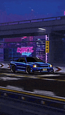 a car is driving down a street in front of an initial club