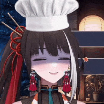 a girl wearing a chef 's hat is smiling .