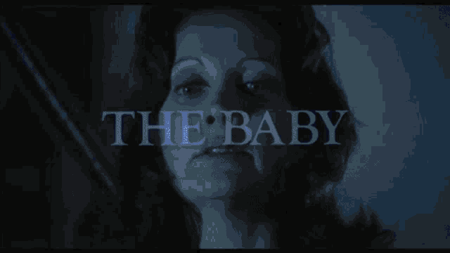 a close up of a woman 's face with the words " the baby " written above her