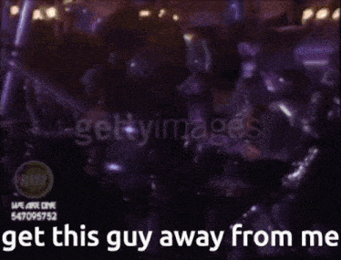 a purple background with the words get this guy away from me written on it