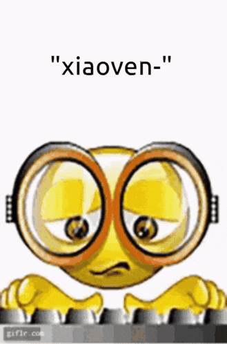 a cartoon smiley face wearing glasses is typing on a keyboard