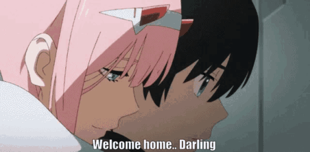 a couple of anime characters with the words welcome home darling