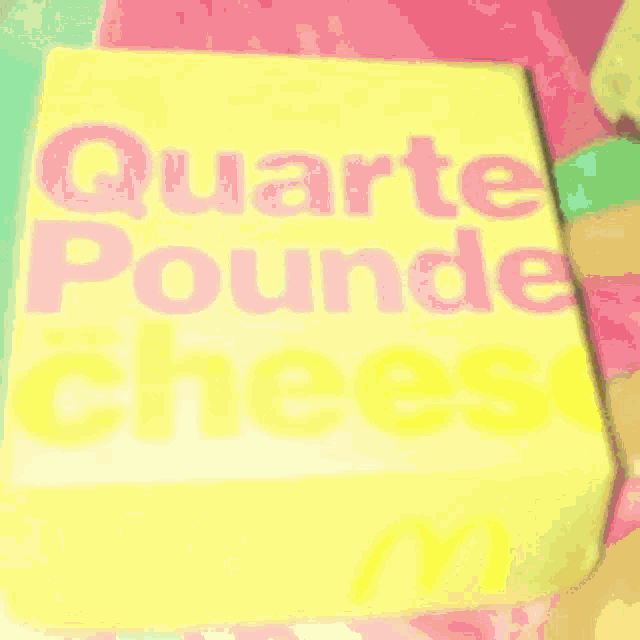 a mcdonald 's quarter pound cheese box is being opened