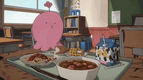 a pink octopus is sitting at a table with a tray of food and a milk carton with a cow on it