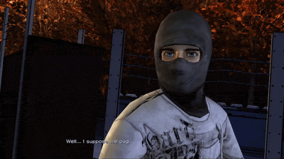 a man with a beard is talking to a man in a mask