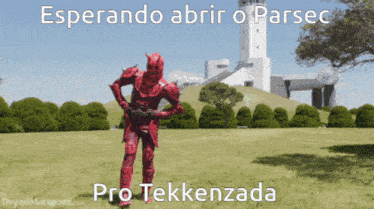 a man in a red armor stands in a grassy field with the words " esperando abrir o parsec " above him