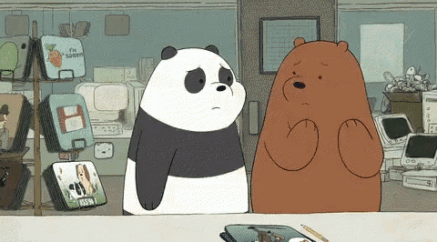 a panda bear and a brown bear are standing next to each other in a room