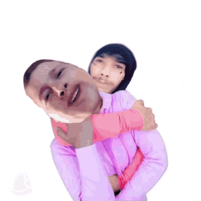 a man in a pink shirt is holding another man 's head