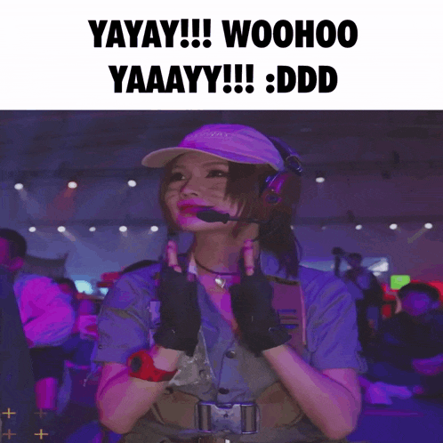 a woman wearing a headset and gloves says yayay woohoo yaaay ddd