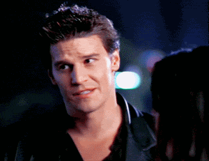 a close up of a man 's face with a serious look on his face
