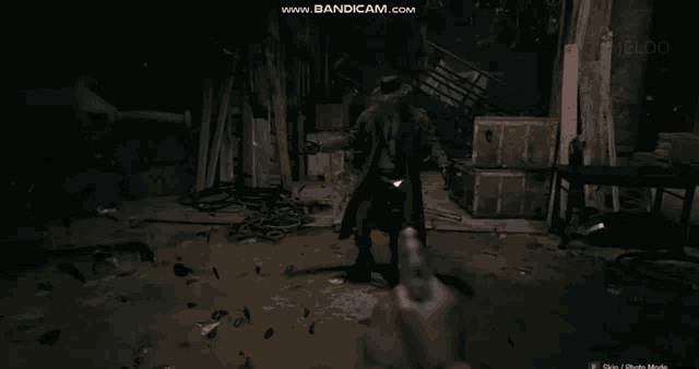 a video game screen shows sparks coming out of a gun and says bandicam.com at the top