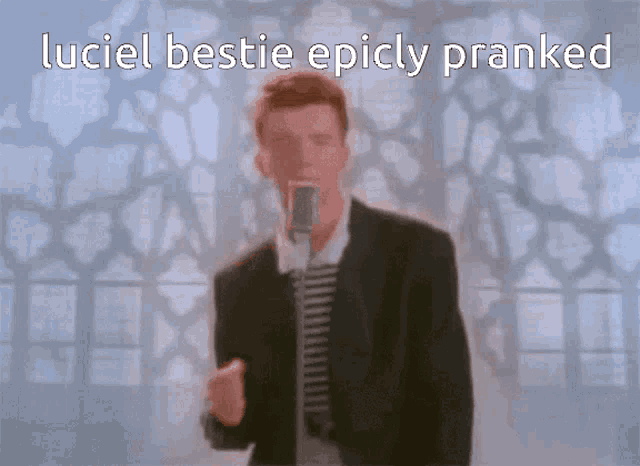 a man singing into a microphone with the words luciel bestie epicly pranked below him