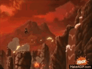 a cartoon character is laying on the ground with a fireball coming out of his mouth .