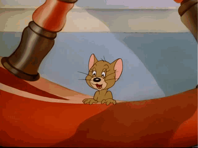 a cartoon jerry mouse is smiling in front of a chess board